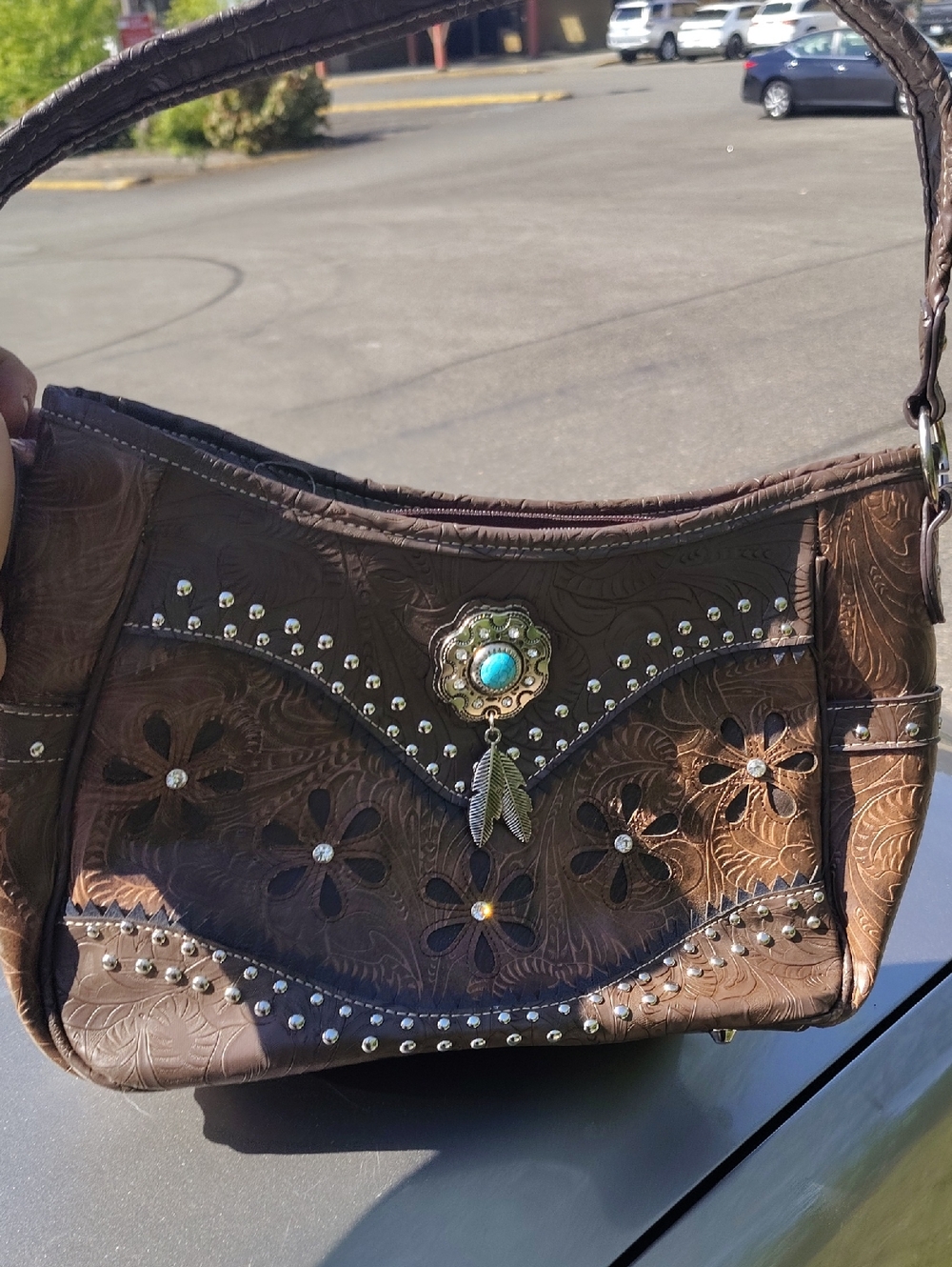 Brown Floral Tooled Shoulder Bag with Turquoise Medallion Accent